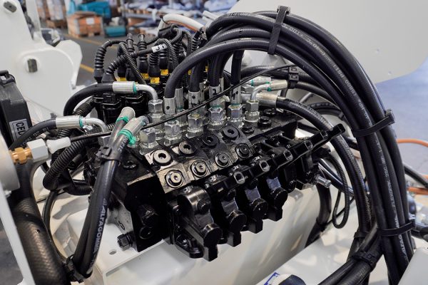 Electrohydraulic valve with functions controlled by a single-lever joystick